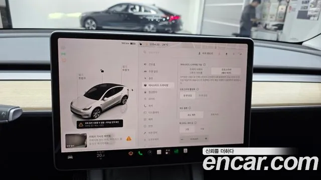 Tesla Model Y — Фото автомобиля 29