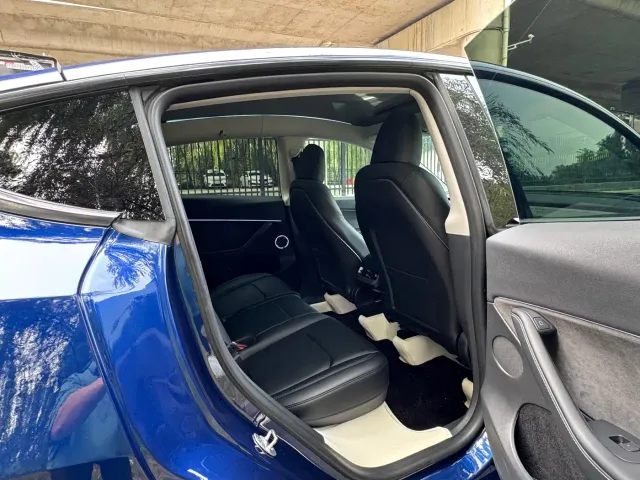 Tesla Model Y — Фото автомобиля 12