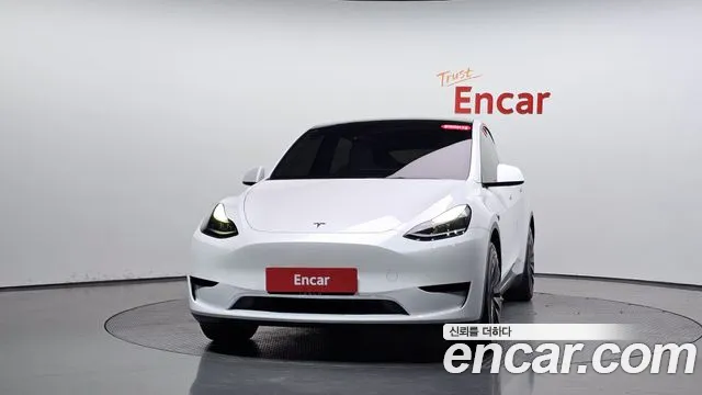 Tesla Model Y — Фото автомобиля 2