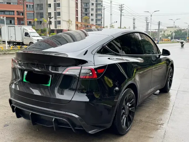 Tesla Model Y — Фото автомобиля 9