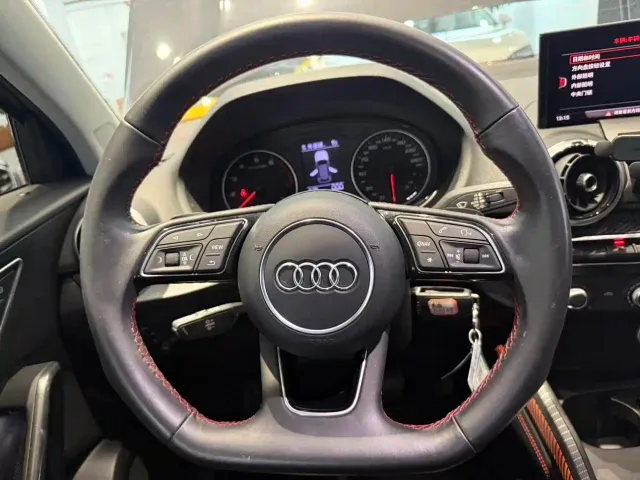 Audi Q2L — Фото автомобиля 11