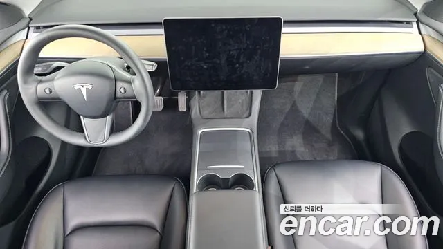 Tesla Model Y — Фото автомобиля 7