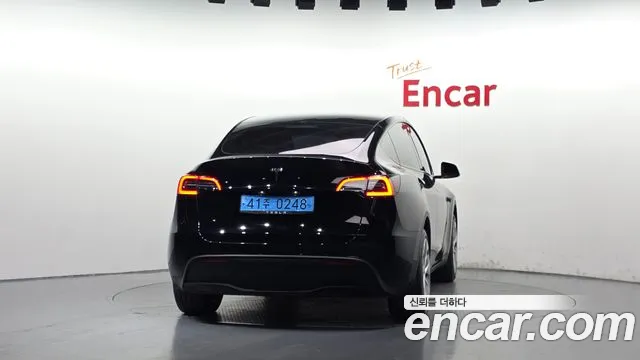 Tesla Model Y — Фото автомобиля 4