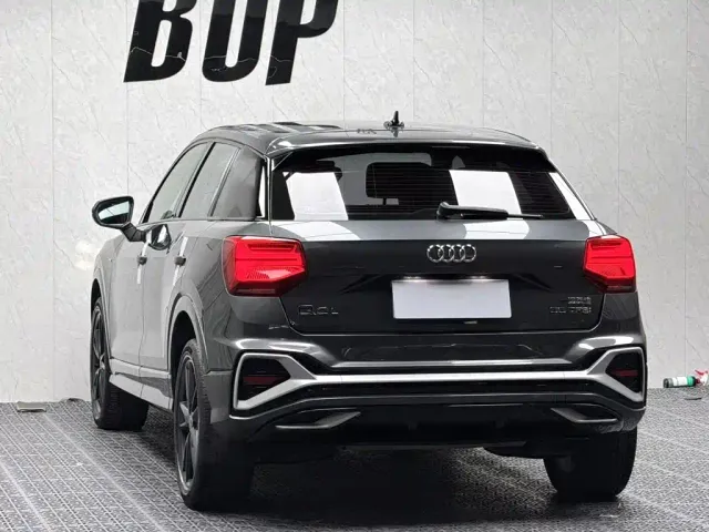 Audi Q2L — Фото автомобиля 11