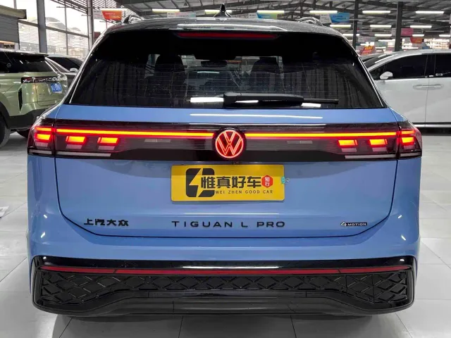 Volkswagen Tiguan L — Фото автомобиля 24