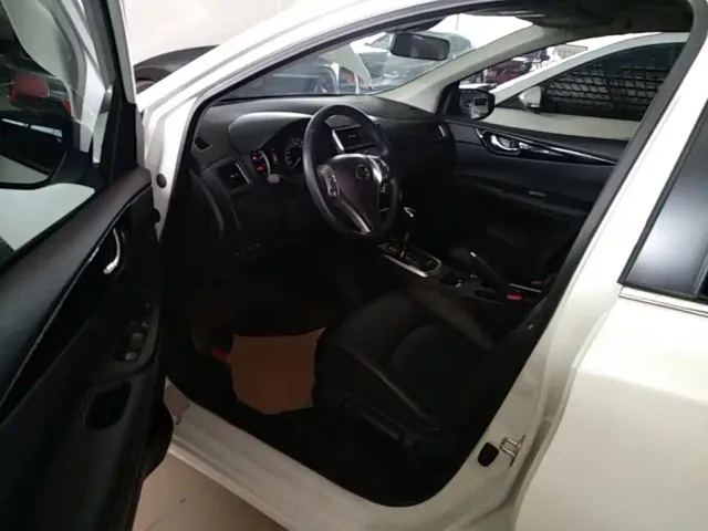 Nissan Tiida — Фото автомобиля 14