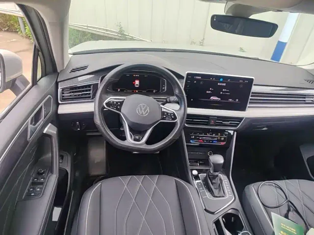Volkswagen Tiguan L — Фото автомобиля 14