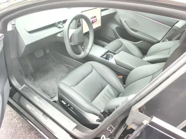 Tesla Model 3 — Фото автомобиля 9