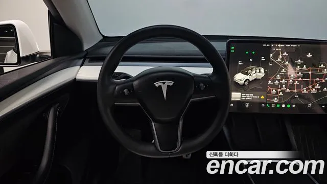 Tesla Model Y — Фото автомобиля 11