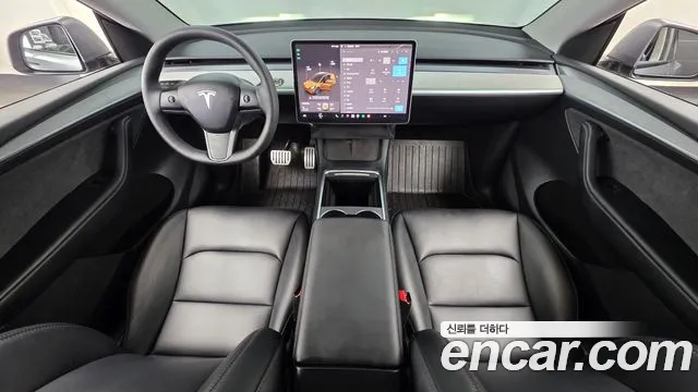 Tesla Model Y — Фото автомобиля 7