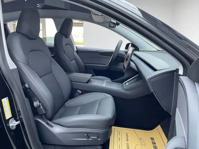 Tesla Model Y — Фото автомобиля 18