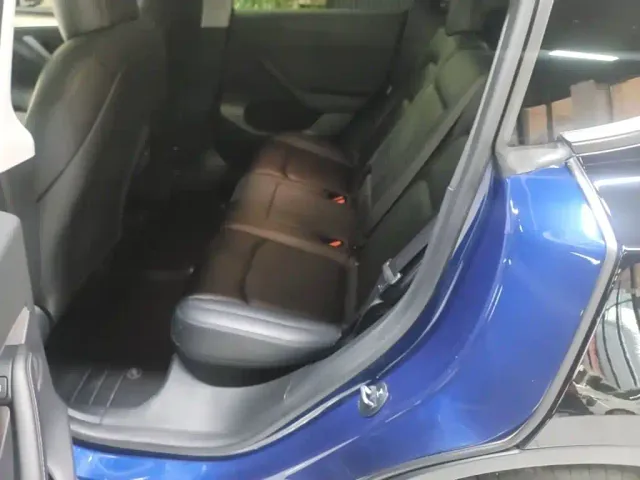 Tesla Model Y — Фото автомобиля 16