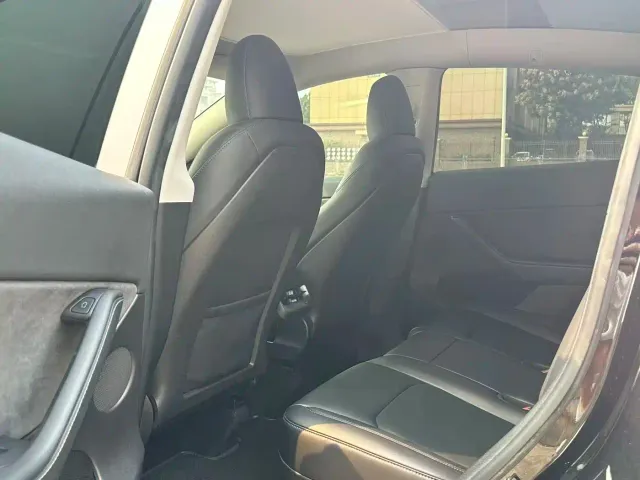 Tesla Model Y — Фото автомобиля 7