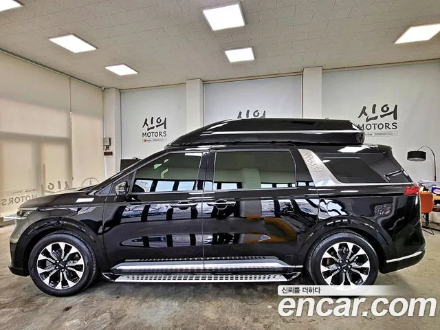 Kia Carnival Generation 4 — Фото автомобиля 5