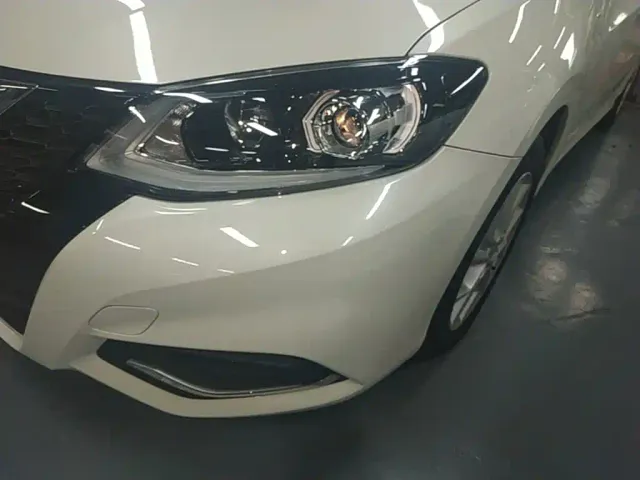 Nissan Tiida — Фото автомобиля 23