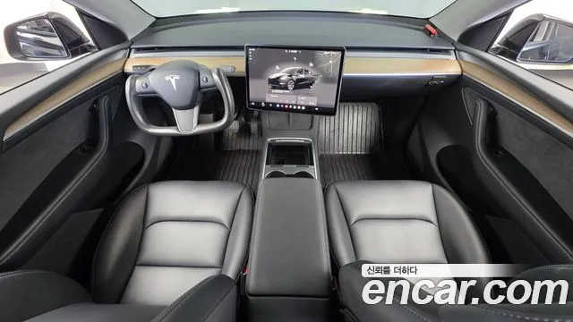 Tesla Model Y — Фото автомобиля 10