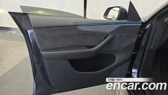 Tesla Model Y — Фото автомобиля 13