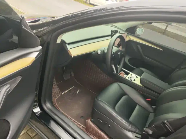 Tesla Model Y — Фото автомобиля 15