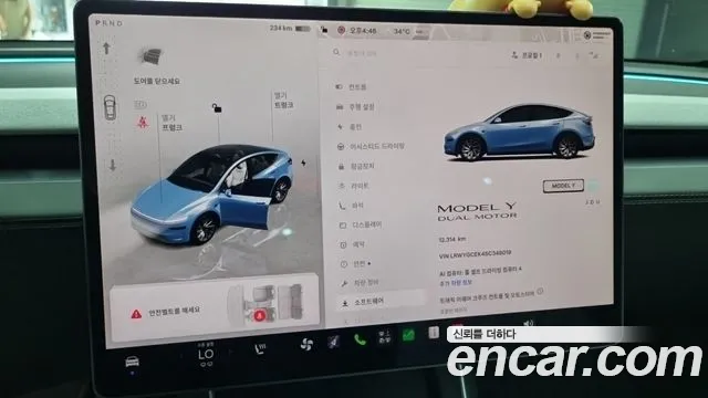 Tesla Model Y — Фото автомобиля 8