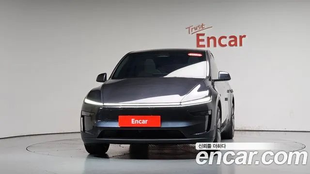 Tesla Model Y — Фото автомобиля 3