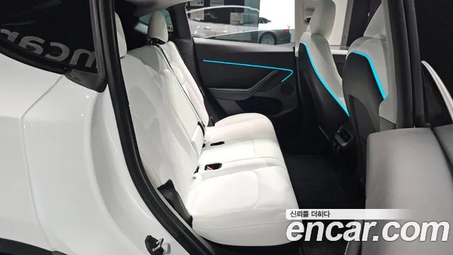 Tesla Model Y — Фото автомобиля 17