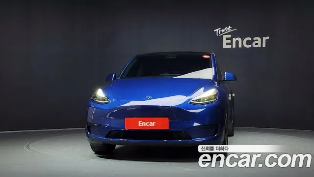 Tesla Model Y — Фото автомобиля 3