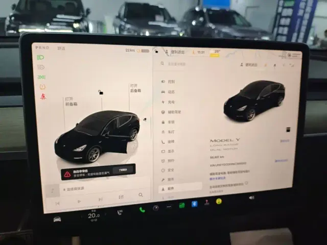 Tesla Model Y — Фото автомобиля 12