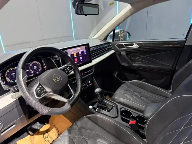 Volkswagen Tiguan L — Фото автомобиля 11
