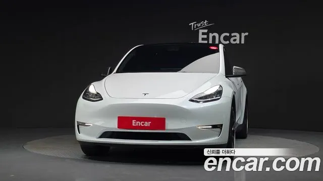 Tesla Model Y — Фото автомобиля 3