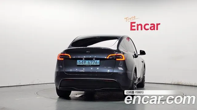 Tesla Model Y — Фото автомобиля 4