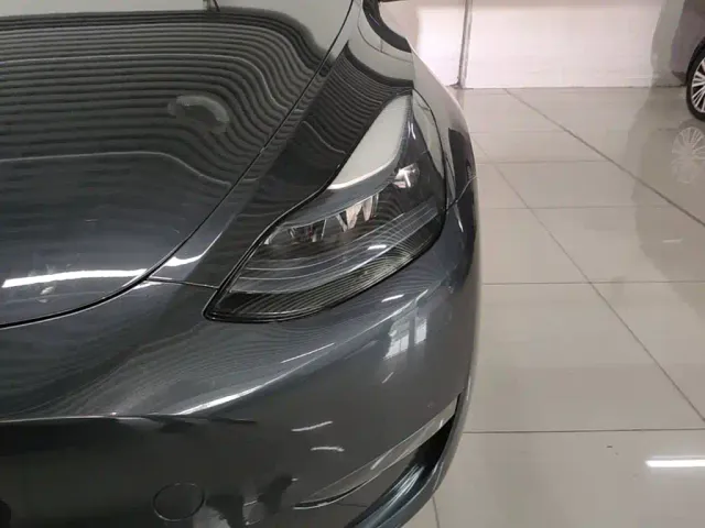 Tesla Model Y — Фото автомобиля 23