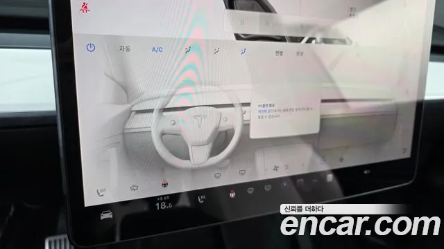 Tesla Model Y — Фото автомобиля 25