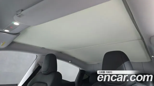 Tesla Model Y — Фото автомобиля 29