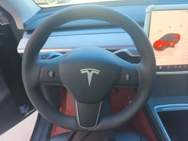 Tesla Model Y — Фото автомобиля 10