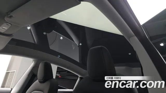 Tesla Model Y — Фото автомобиля 14