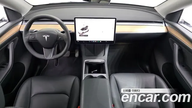 Tesla Model Y — Фото автомобиля 7