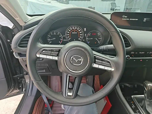 Mazda Axela — Фото автомобиля 10