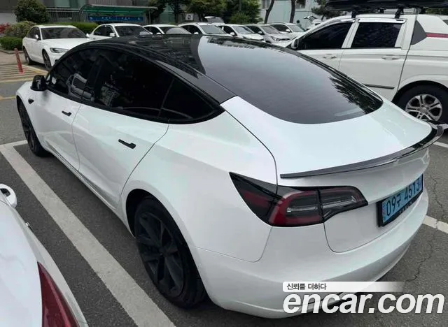 Tesla Model 3 — Фото автомобиля 8