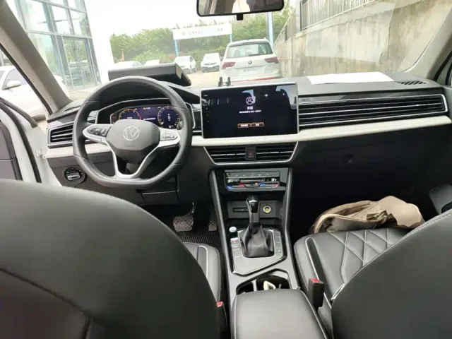 Volkswagen Tiguan L — Фото автомобиля 9