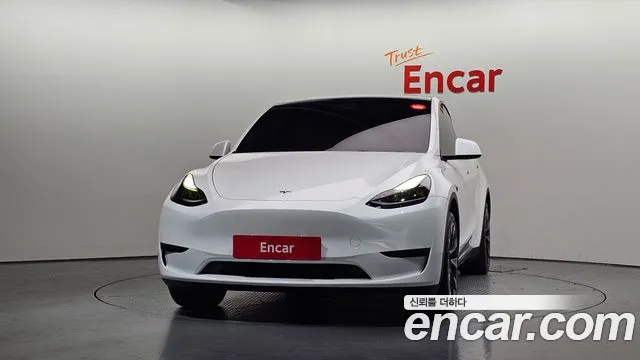 Tesla Model Y — Фото автомобиля 3