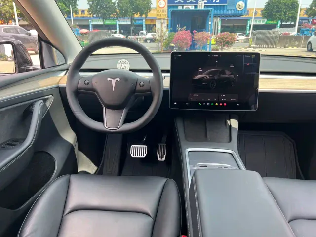 Tesla Model Y — Фото автомобиля 7