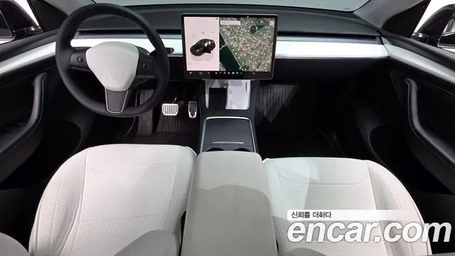 Tesla Model Y — Фото автомобиля 10