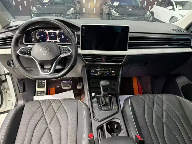 Volkswagen Tiguan L — Фото автомобиля 9