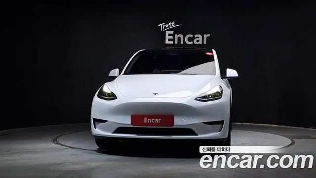 Tesla Model Y — Фото автомобиля 3