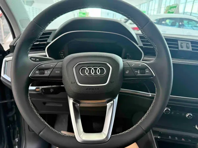 Audi Q3 — Фото автомобиля 12