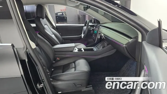 Tesla Model Y — Фото автомобиля 26
