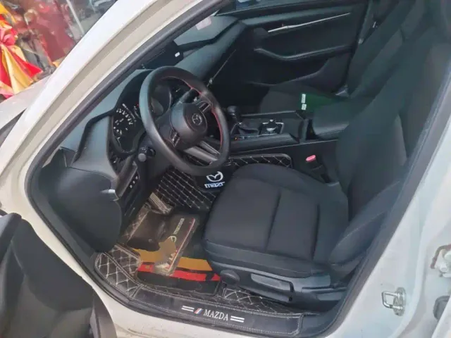 Mazda Axela — Фото автомобиля 14