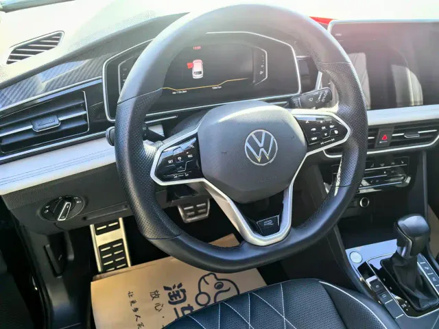 Volkswagen Tiguan L — Фото автомобиля 5