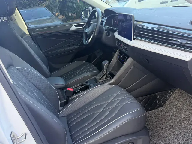 Volkswagen Tiguan L — Фото автомобиля 11