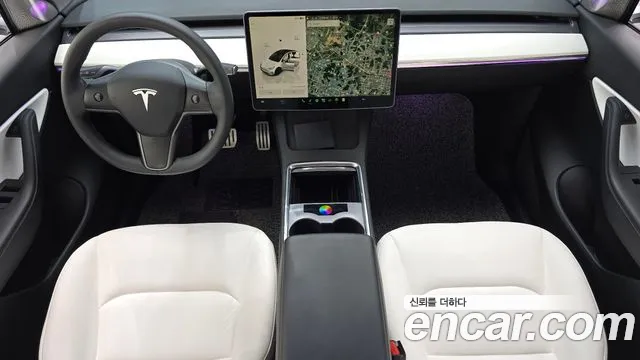 Tesla Model Y — Фото автомобиля 7